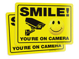 Smile You're on Camera Sign – Aluminum, Vinyl & Plastic