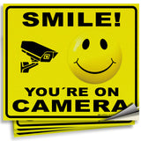 Smile You're on Camera Sign – Aluminum, Vinyl & Plastic